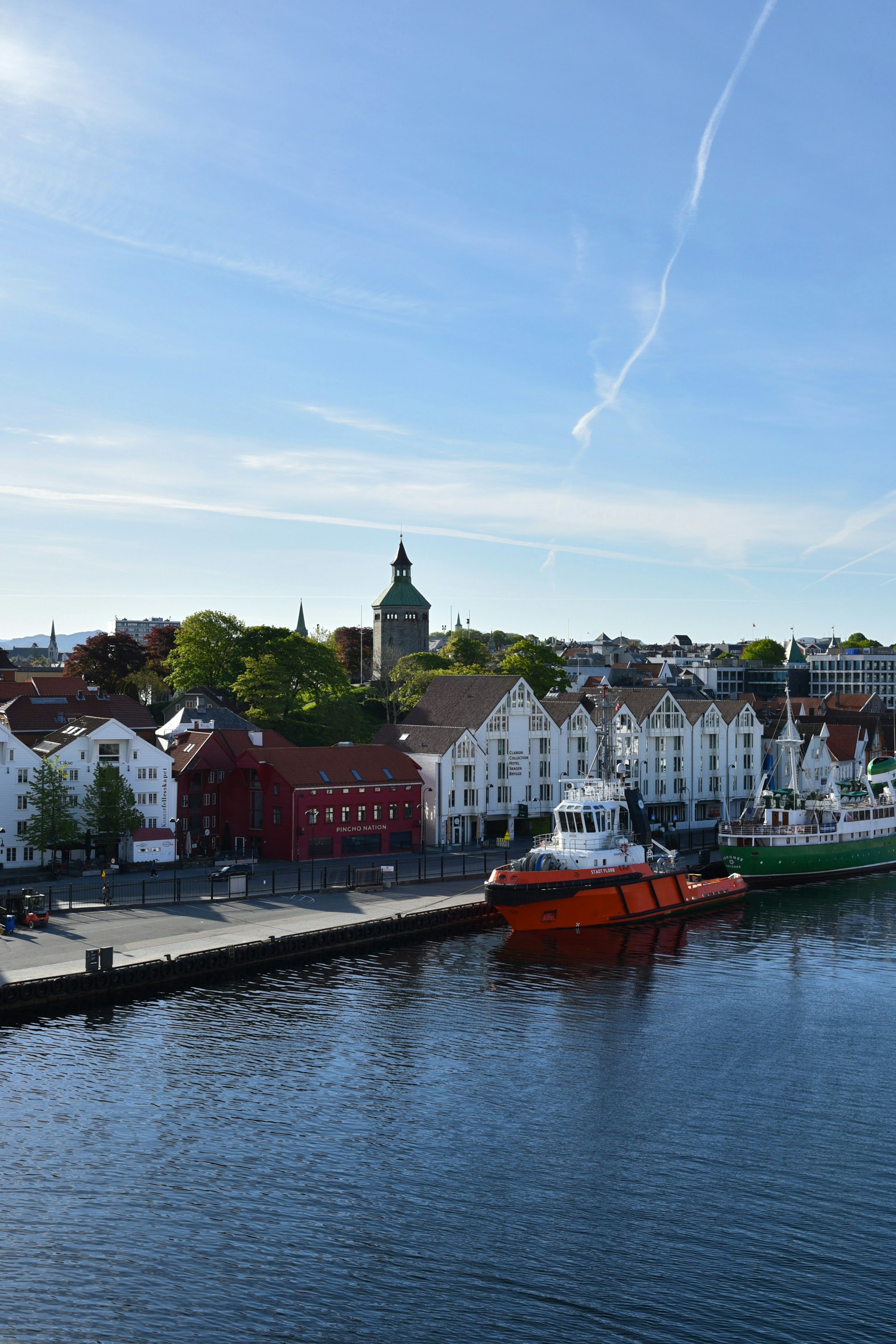 Boats and traditional buildings around Stavanger harbour